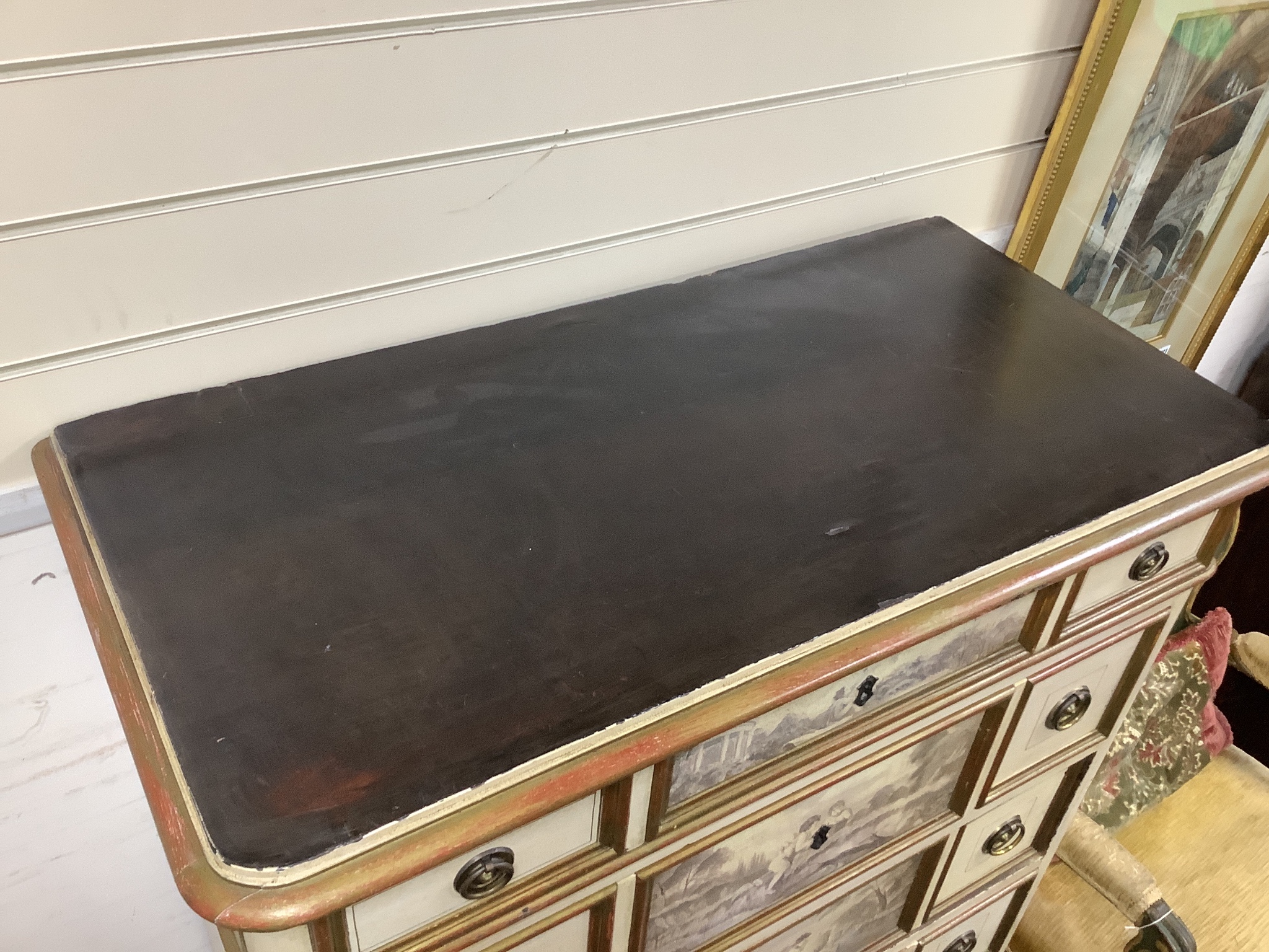 A mid 20th century Italian style painted six drawer chest decorated with cherub landscapes width 90cm, depth 45cm, height 140cm.